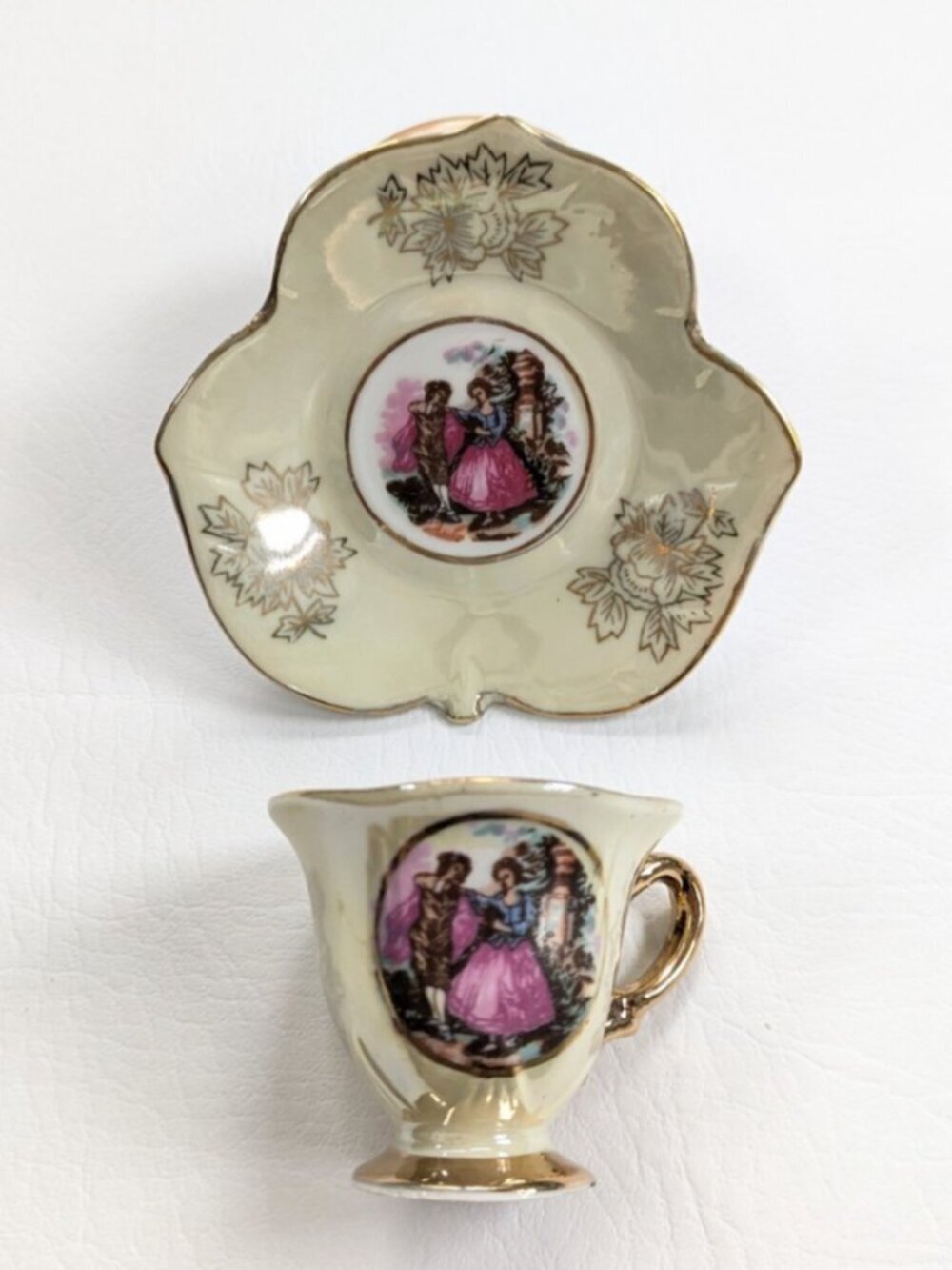 Vintage Royal Crown Porcelain Teacup & Saucer Courting Couple Yellow Iridescent